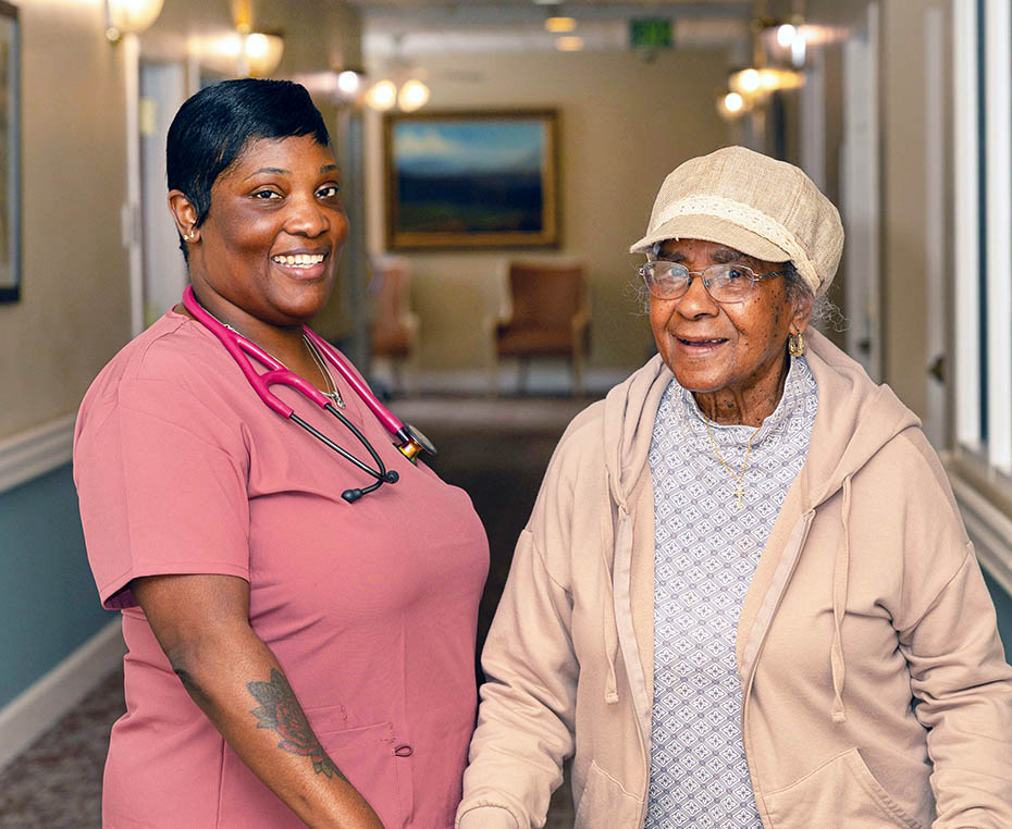 caregiver and resident in nursing and rehab center